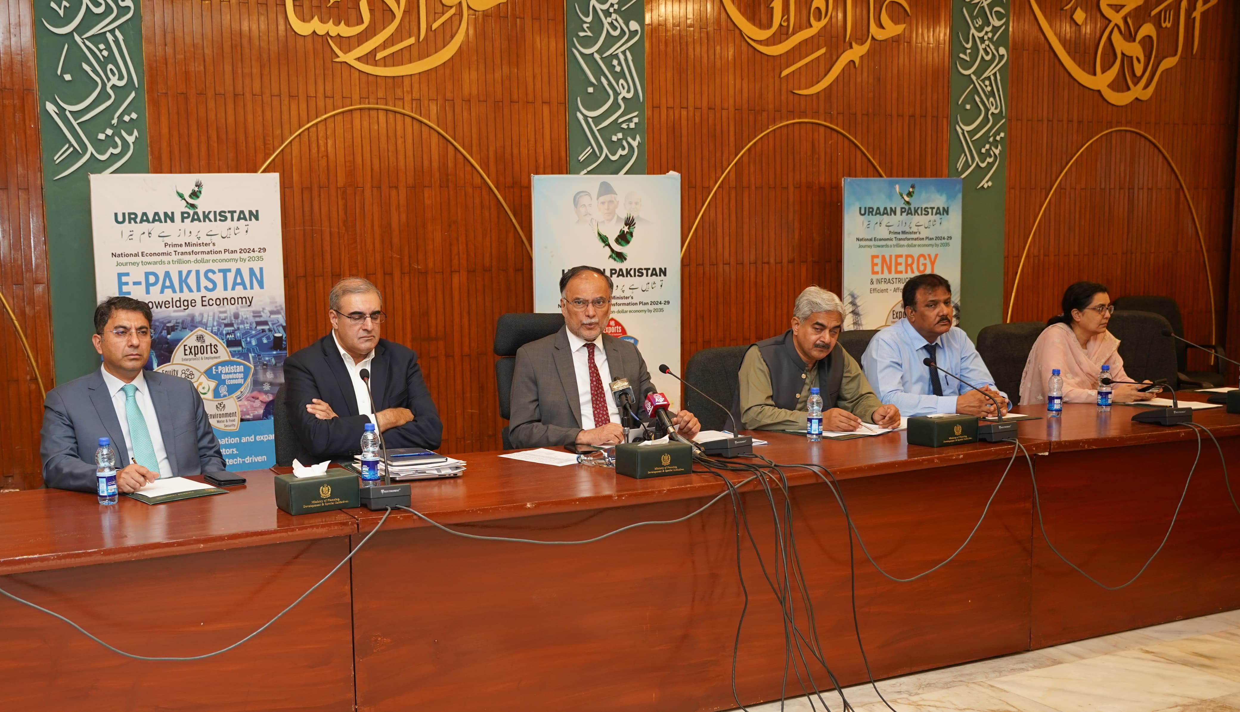 Federal Minister for Planning Ahsan Iqbal addressing a briefing during the launching ceremony of the Monthly Development Report for July, held in Islamabad 