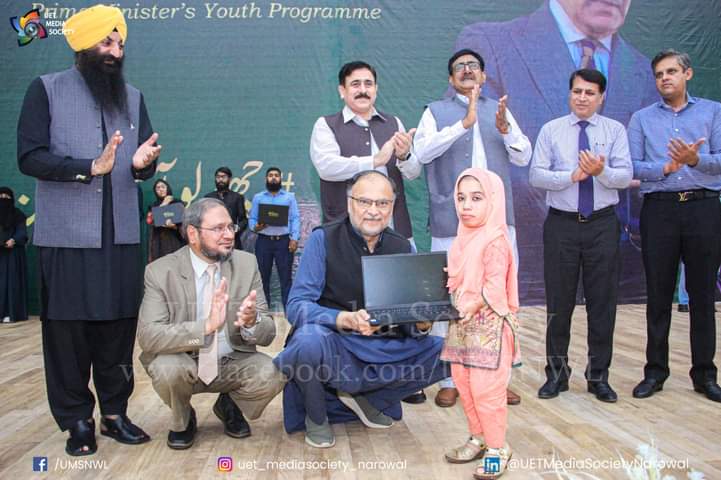 Ahsan Iqbal Kneels in Respect to Present Award to Sania Abbas, Celebrating Her Inspiring Journey